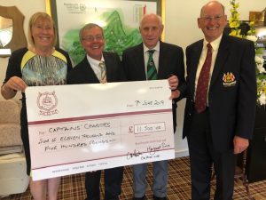 Cheque from Kenilwirht Golf Club, recieved by Roger Davies of Cancer Research, Chris Peake and Maggie Smith, along with Barry Ritchie